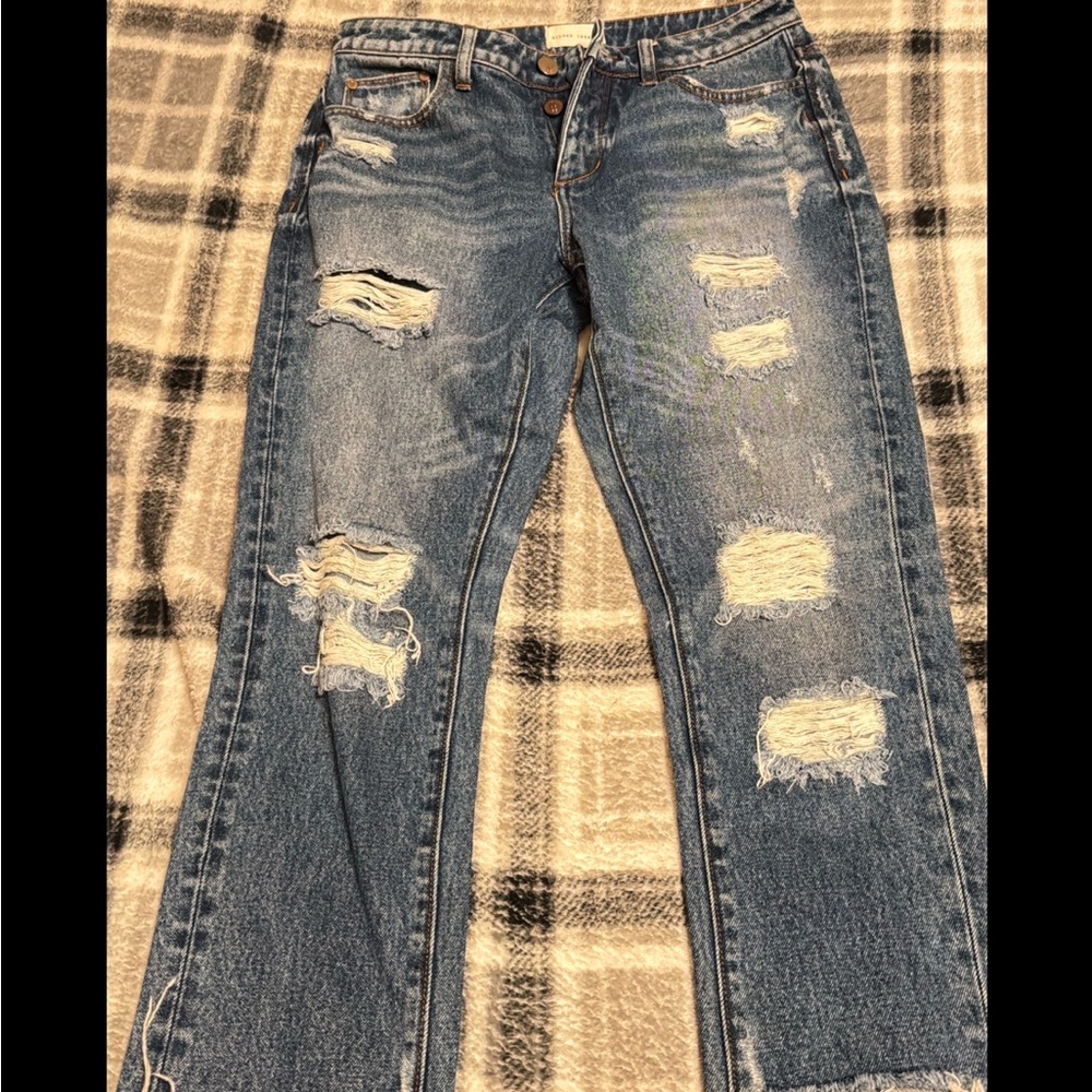 Distressed Blue Denim Jeans